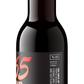 A dark brown glass bottle of stout beer with a black label featuring orange and white text, photographed on a clean white background.