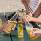 Three bottles of 45 Días Mexican Lager in the sun on green tables outside Brus Brewpub in Nørrebro in Copenhagen, Denmark.