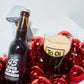 45 days of darkness dark battle pured in To Øl beer glas with christmas decoration and white background.