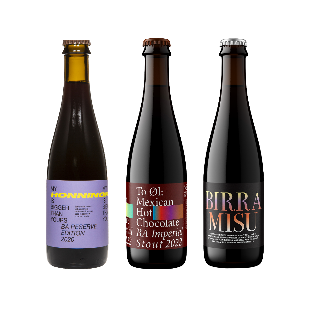 Three beer bottles of BA with colorful labels on.