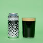 A silver can of To:Ol' Porter Porter alongside a clear glass filled with dark stout beer and a thick tan head, set against a solid light green background.