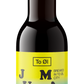 A bottle of Jule Malt 2.0 beer with a Christmas-themed label in yellow and black colors, indicating a dark and heavy stout. Imperial Milk Stout 15% – To Øl Danish Craft Beer.