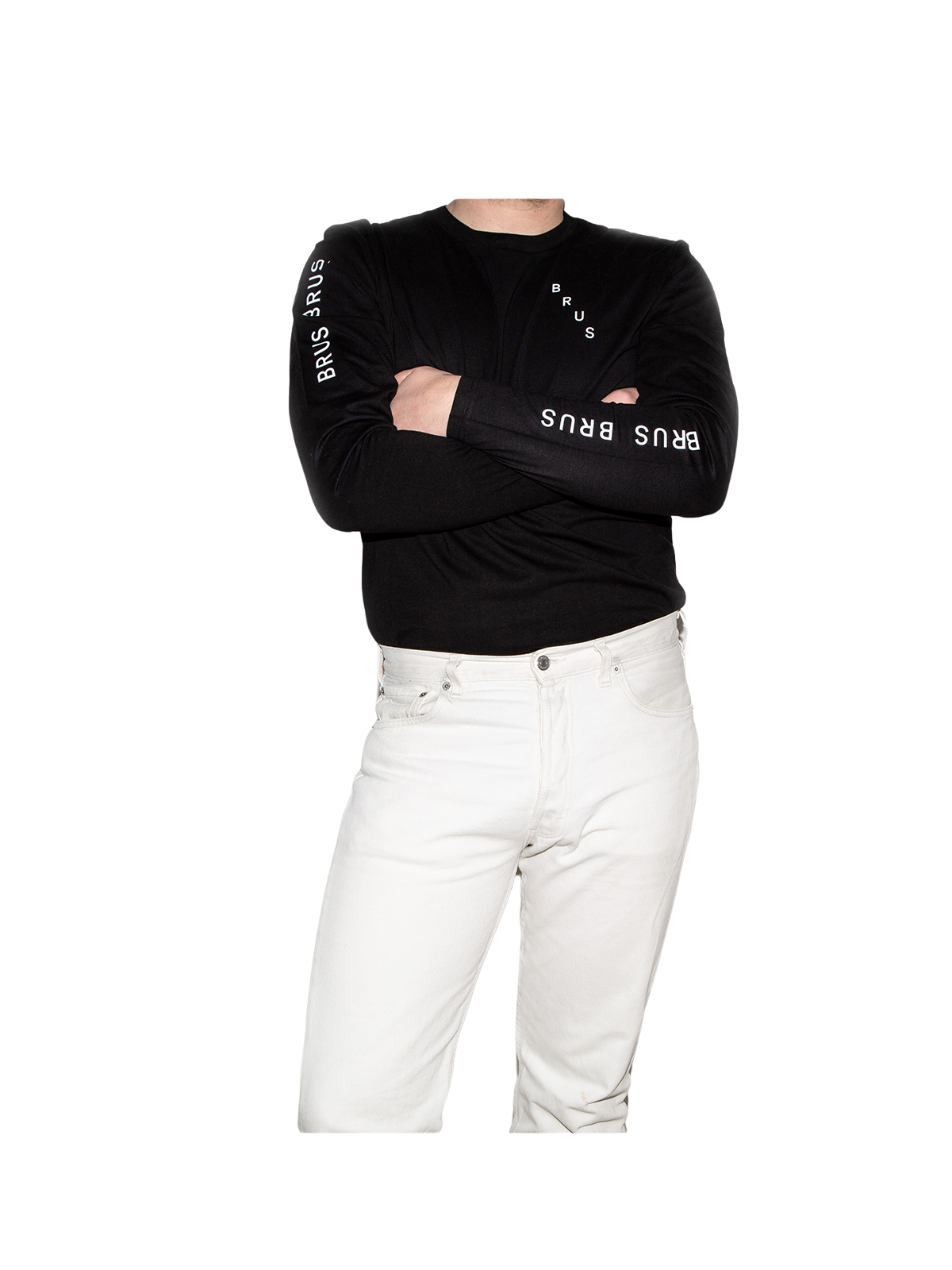 Person wearing BRUS merch: a black long-sleeve shirt with branding and white pants.